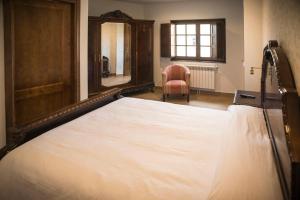 Łóżko lub łóżka w pokoju w obiekcie Hotel portico