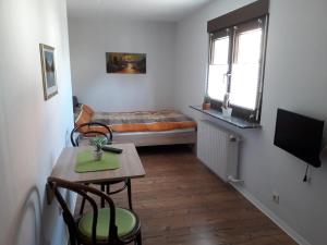 Ein Bett oder Betten in einem Zimmer der Unterkunft Zimmervermietung St.Wendel