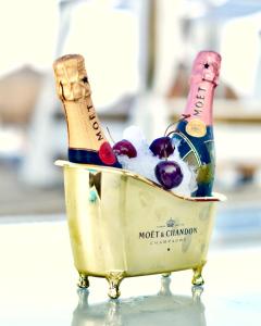 two bottles of champagne in a bucket at Gran Hotel Guadalpín Banus in Marbella