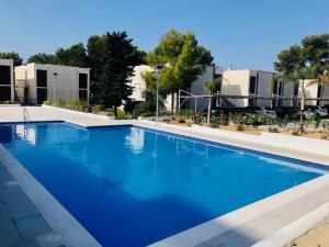 Bazén v ubytování Apartment SunClub CalaVinya nebo v jeho okolí