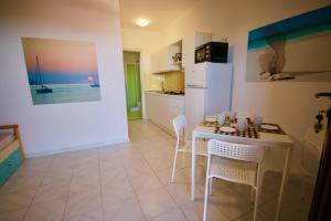A cozinha ou cozinha compacta de Summer Residence Bunte
