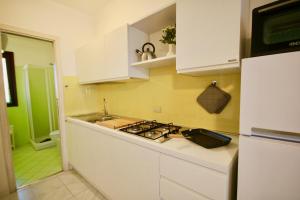 A cozinha ou cozinha compacta de Summer Residence Bunte