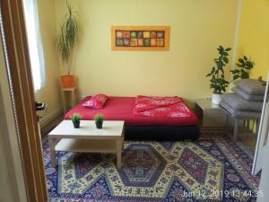 Łóżko lub łóżka w pokoju w obiekcie Garden Apartment Donau-City (P&R)
