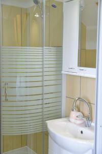 Koupelna v ubytování Apartmani Bojeresku Negotin