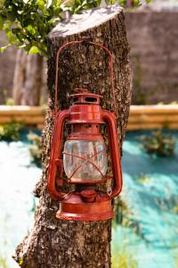 a red light on the side of a tree at Casa Federico in Tremosine Sul Garda