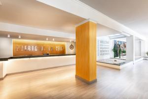 a lobby of a building with a sign that reads pride of london at Sol Puerto de la Cruz Tenerife in Puerto de la Cruz