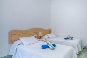 Postel nebo postele na pokoji v ubytování Holiday Home S'Arraval