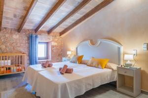 Postel nebo postele na pokoji v ubytování Holiday Home S'Arraval