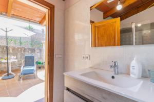 Koupelna v ubytování Holiday Home S'Arraval