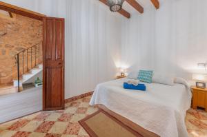 Postel nebo postele na pokoji v ubytování Holiday Home S'Arraval