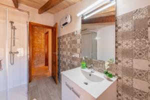 Koupelna v ubytování Holiday Home S'Arraval