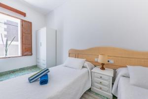 Postel nebo postele na pokoji v ubytování Holiday Home S'Arraval