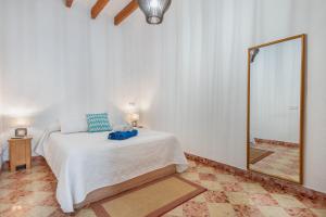 Postel nebo postele na pokoji v ubytování Holiday Home S'Arraval