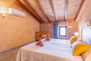 Postel nebo postele na pokoji v ubytování Holiday Home S'Arraval