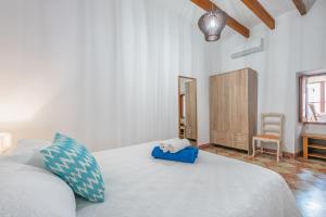 Postel nebo postele na pokoji v ubytování Holiday Home S'Arraval