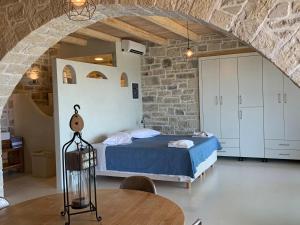 Posteľ alebo postele v izbe v ubytovaní VILLA SELINI LUXURY APARTMENT
