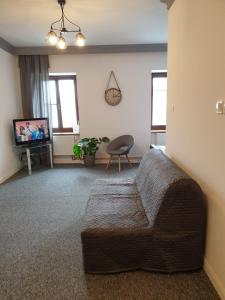 Telewizja i/lub zestaw kina domowego w obiekcie Apartamenty Stary Browar Oleśnica