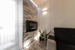 Televízia a/alebo spoločenská miestnosť v ubytovaní Amuri Holiday Apartment