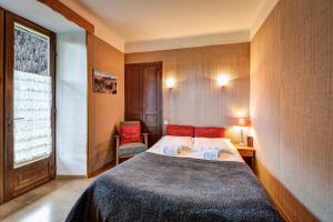 Postel nebo postele na pokoji v ubytování Hôtel Restaurant Gîtes Les 5 Saisons