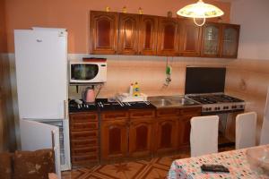 Kuchyň nebo kuchyňský kout v ubytování Apartman Linda + 5 fotografií
