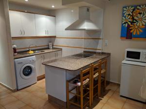 Virtuvė arba virtuvėlė apgyvendinimo įstaigoje Apartamento zona residencial Montesol
