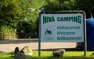 Certifikát, hodnocení, plakát nebo jiný dokument vystavený v ubytování Nivå Camping & Cottages
