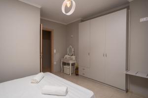 Posteľ alebo postele v izbe v ubytovaní Anemomilos Casa ideale 1st floor