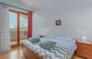 Posteľ alebo postele v izbe v ubytovaní Apartment Kristijan with Balcony