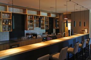 Lounge nebo bar v ubytování Feriendorf am Bakenberg