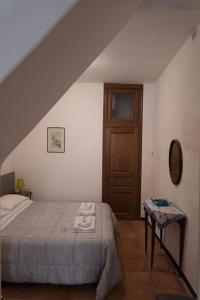 Postel nebo postele na pokoji v ubytování Camere Nicolina 3