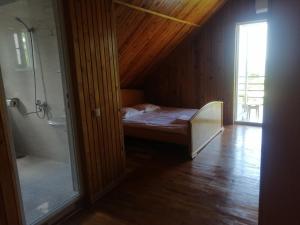 Postel nebo postele na pokoji v ubytování David Dali House