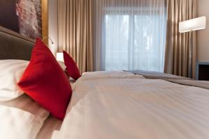Posteľ alebo postele v izbe v ubytovaní Hotel Forza