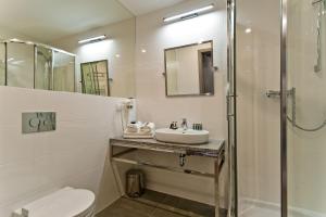 Kúpeľňa v ubytovaní Hotel Forza