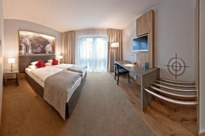 Posteľ alebo postele v izbe v ubytovaní Hotel Forza