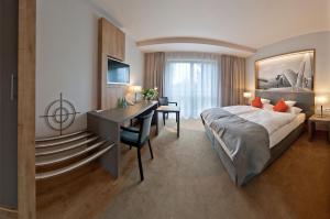 Posteľ alebo postele v izbe v ubytovaní Hotel Forza + 37 fotografií