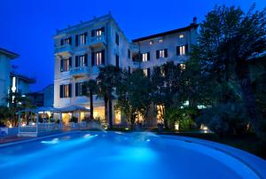 Πισίνα στο ή κοντά στο Hotel Parma e Oriente Wellness & Spa
