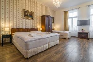 Postel nebo postele na pokoji v ubytování RETRO Apartments Bosak Contactless check-in