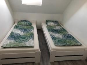 Postel nebo postele na pokoji v ubytování Marci Apartman