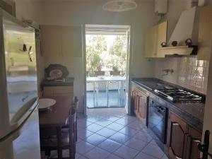 A kitchen or kitchenette at CAPERCIA home