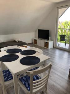 TV a/nebo společenská místnost v ubytování Marci Apartman
