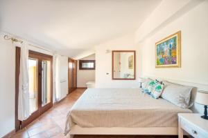 Кровать или кровати в номере Villa Anbegia