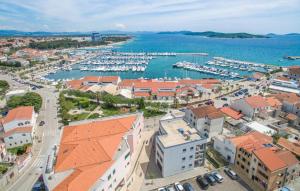 an aerial view of a harbor with boats at Apartments Villa-Ines Center in Vodice