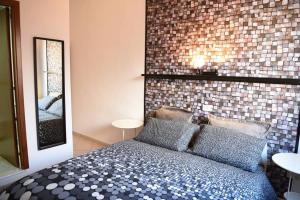 Postel nebo postele na pokoji v ubytování la casa di asmei b & b Lucera