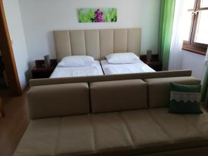 Letto o letti in una camera di Winzerhof Michael Gartner