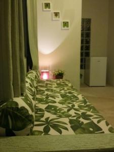 Tempat tidur dalam kamar di Pousada e Restaurante Maria das Flores