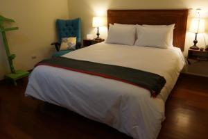 Katil atau katil-katil dalam bilik di Atrium Miraflores Hotel