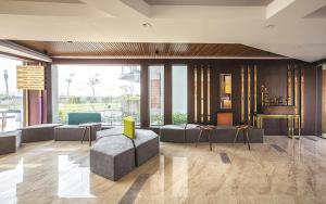 Posezení v ubytování Hotel Sonar Bangla Taki