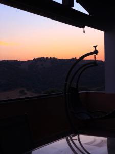 a view of the sunset from a bath tub at Agriturismo Sa Tanca Noa in Tergu
