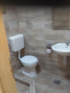Koupelna v ubytování TARA INN Resort