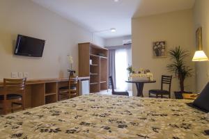 TV a/nebo společenská místnost v ubytování Lazuli Hotel